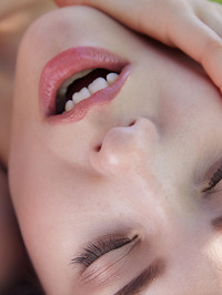 Sweet faced Mila Azul look super sexy sitting naked on a blanket 