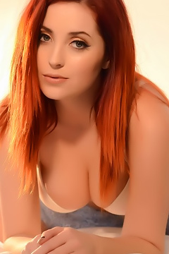 Busty Redhead Lucy Vixen