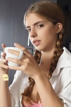 Emelie Cristal Exposing Her Perky Breasts